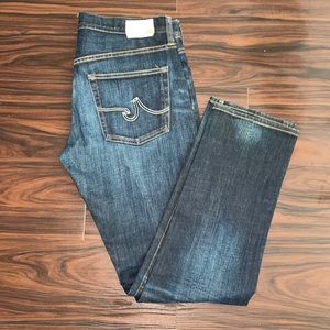 Adriano Goldschmied distress slouchy slim cut. Color-dark blue wash